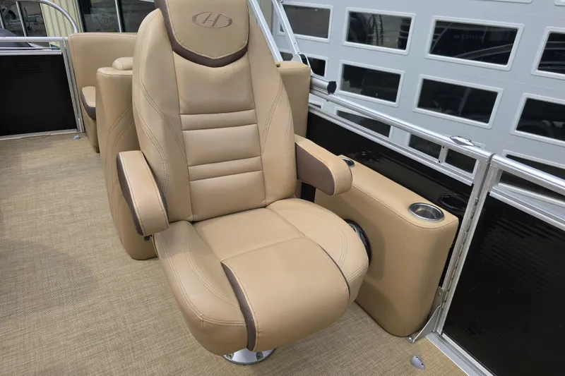 Slide: The Image of Luxurious beige captain's chair on 2017 Harris Solstice 240 pontoon boat. - 22