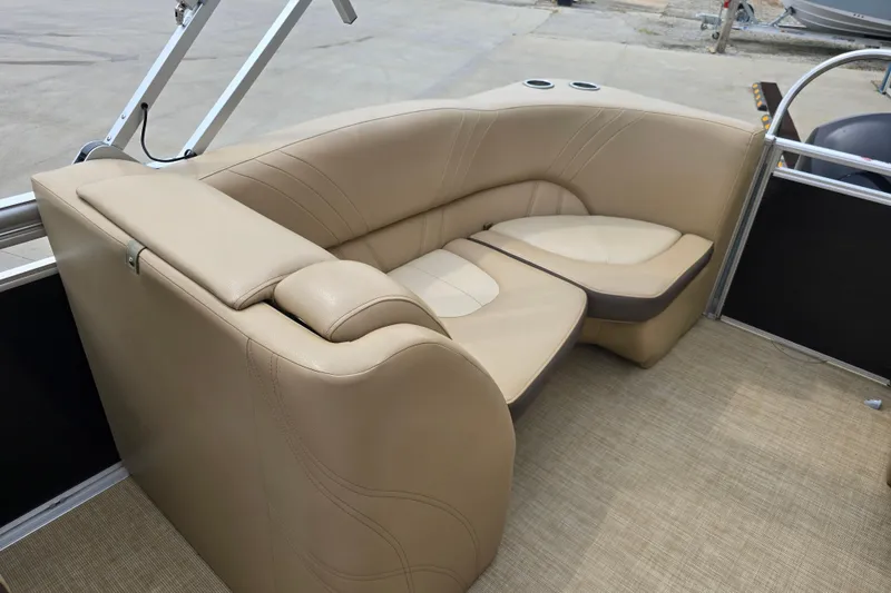 Slide: The Image of Luxurious seating on 2017 Harris Solstice 240 pontoon boat, featuring beige upholstery. - 25
