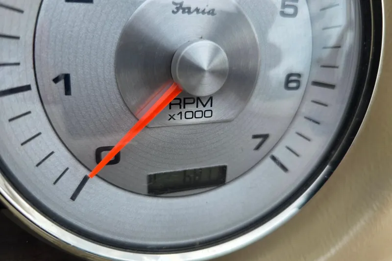 Slide: The Image of Close-up of a 2017 Harris Solstice 240 tachometer showing RPM gauge. - 31