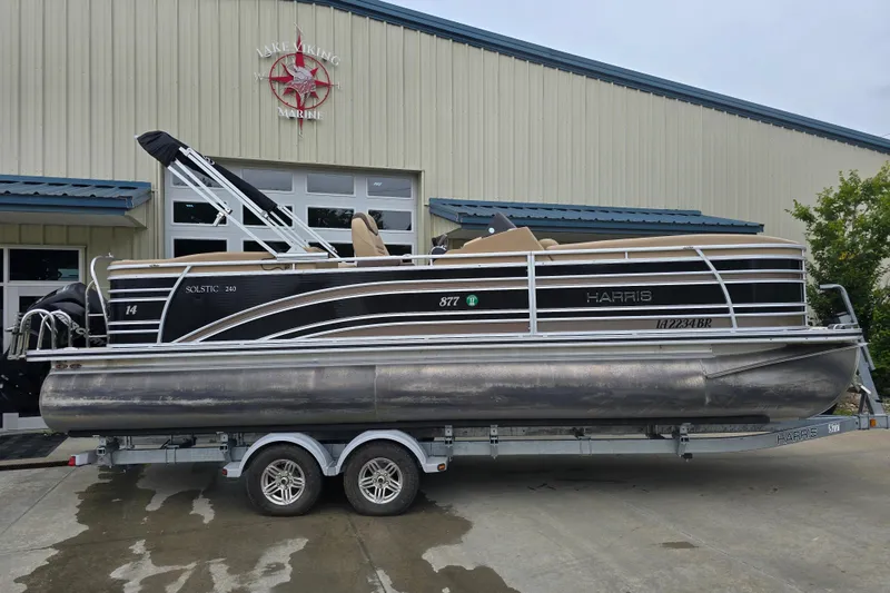 Slide: The Image of 2017 Harris Solstice 240 pontoon boat on trailer at Lake Viking Marine. - 4
