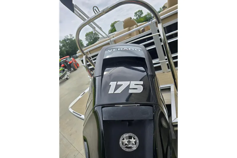 Slide: The Image of 2017 Harris Solstice 240 with Verado 175 outboard motor, docked outdoors. - 9