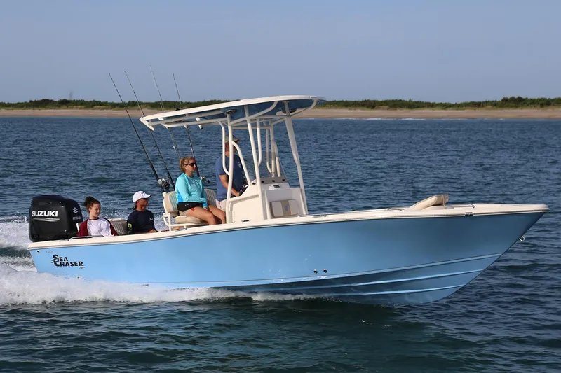 Slide: The Image of 2018 Sea Chaser 21 LX boat interior, showcasing clean white deck and side panel. - 9