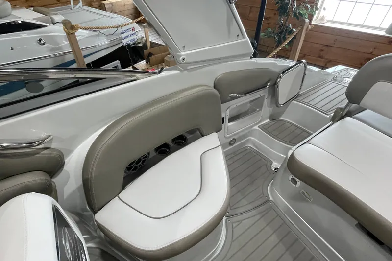 Slide: The Image of 2026 Crownline 260 SS boat interior with sleek seating and modern design. - 10