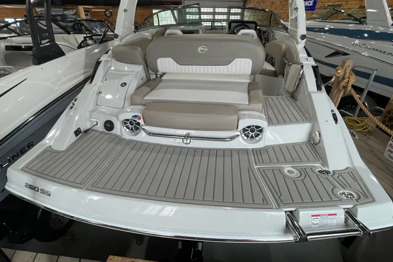 Slide: The Image of 2026 Crownline 260 SS boat with spacious deck and comfortable seating. - 15