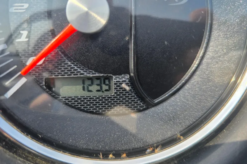 Slide: The Image of Close-up of 2019 Manitou 21 Oasis RF speedometer showing 1239 hours. - 24