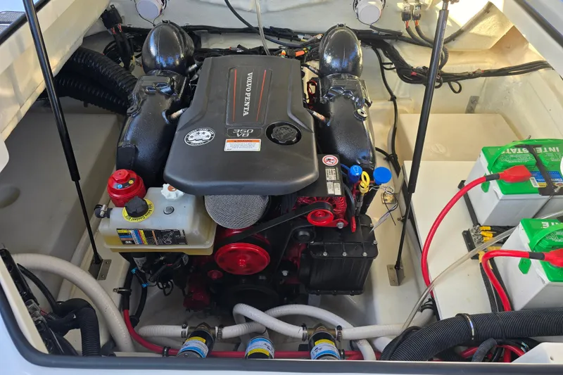 Slide: The Image of 2022 Cobalt R4 Surf engine compartment with Volvo Penta 350 V8 engine and batteries. - 21