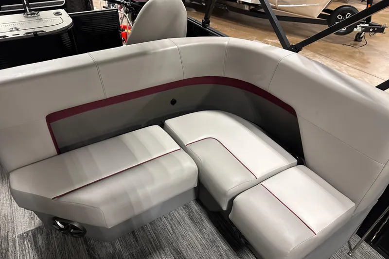 Slide: The Image of 2025 Qwest 18 XRE Cruise boat interior with sleek, modern seating design. - 5