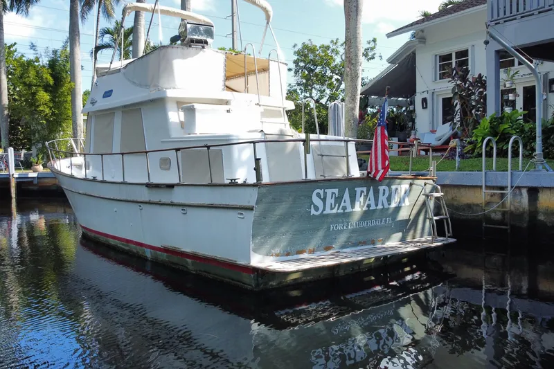 Slide: The Image of 1974 CHB 34 boat named "Seafarer" docked in Fort Lauderdale, Florida. - 56