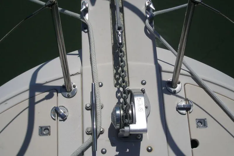 Slide: The Image of Bow deck of 2004 Albin 30 Family Cruiser with anchor chain and winch. - 8