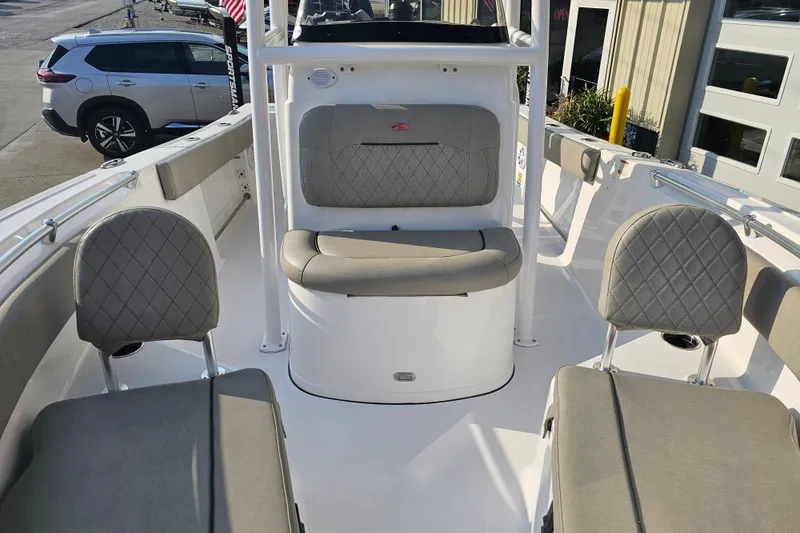 Slide: The Image of 2023 Sportsman Open 212 Center Console boat interior with cushioned seating. - 10