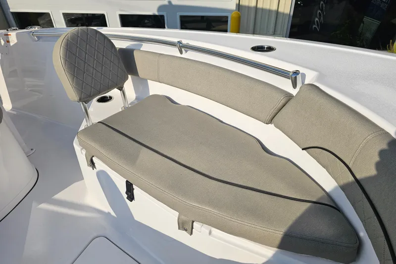 Slide: The Image of 2023 Sportsman Open 212 Center Console boat with cushioned seating and backrest. - 13