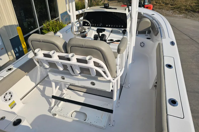 Slide: The Image of 2023 Sportsman Open 212 Center Console boat interior with helm and seating. - 5