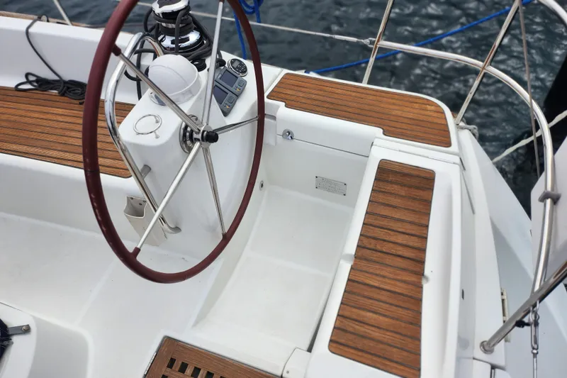 Slide: The Image of Steering wheel and cockpit of 2010 Jeanneau Sun Odyssey 45 DS sailboat. - 15