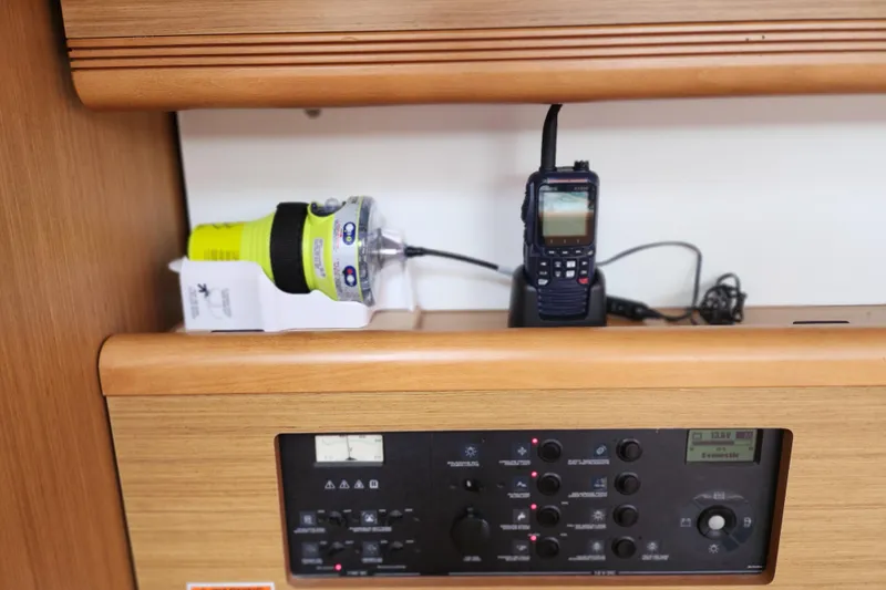 Slide: The Image of Control panel and communication devices on a 2010 Jeanneau Sun Odyssey 45 DS yacht. - 29