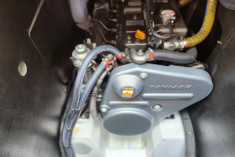 Slide: The Image of Engine compartment of 2010 Jeanneau Sun Odyssey 45 DS with Yanmar engine components. - 36
