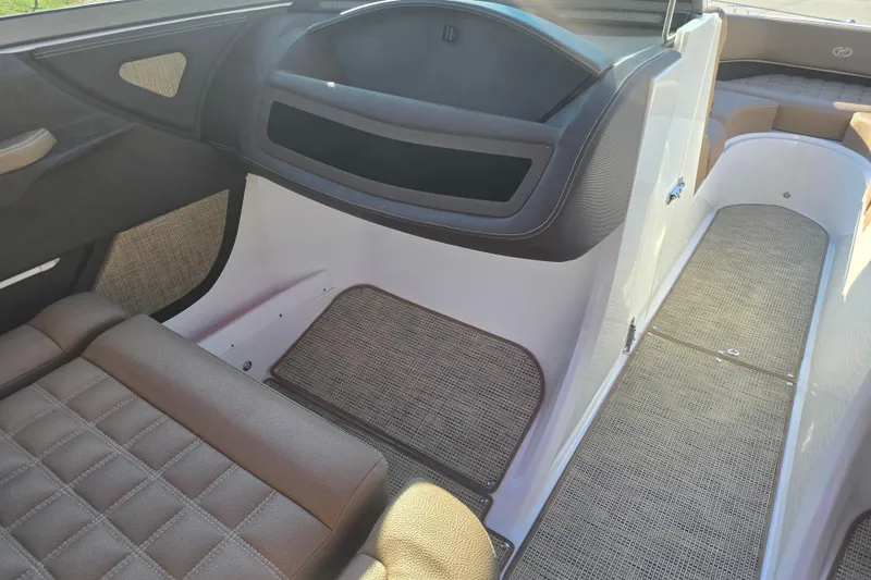 Slide: The Image of 2019 Cobalt R3 Surf interior with brown leather seats and textured flooring. - 15