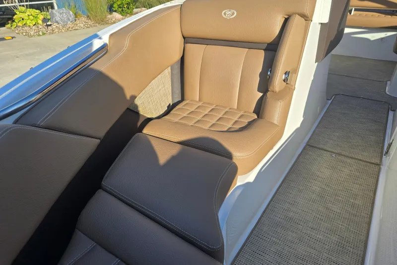 Slide: The Image of Luxurious brown seating in 2019 Cobalt R3 Surf boat interior. - 17