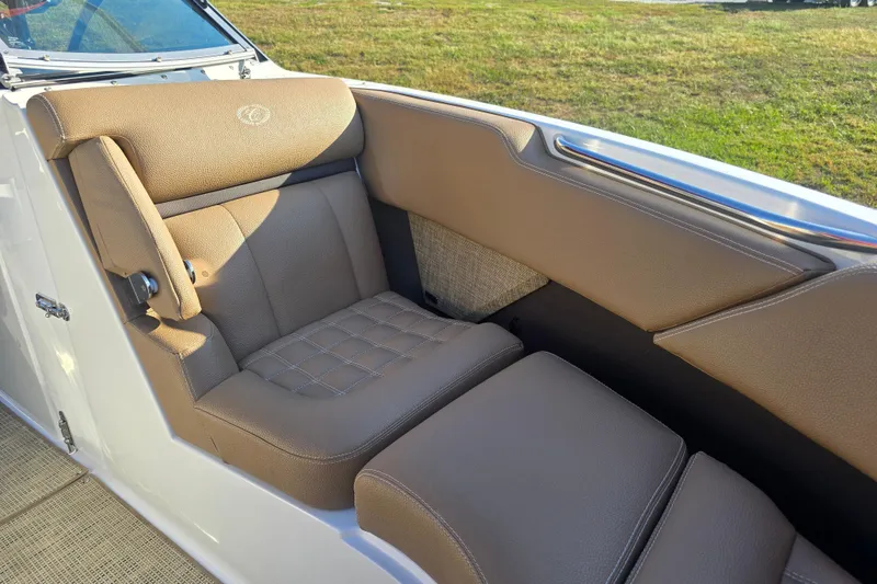 Slide: The Image of Luxurious seating in 2019 Cobalt R3 Surf boat, featuring tan upholstery and elegant design. - 18
