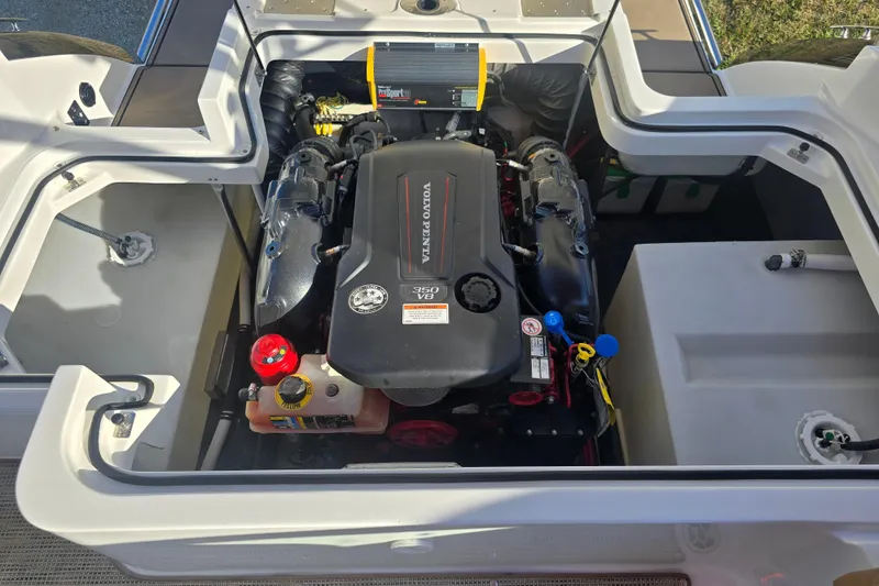 Slide: The Image of 2019 Cobalt R3 Surf boat engine compartment with Volvo Penta 350 V6 engine. - 19