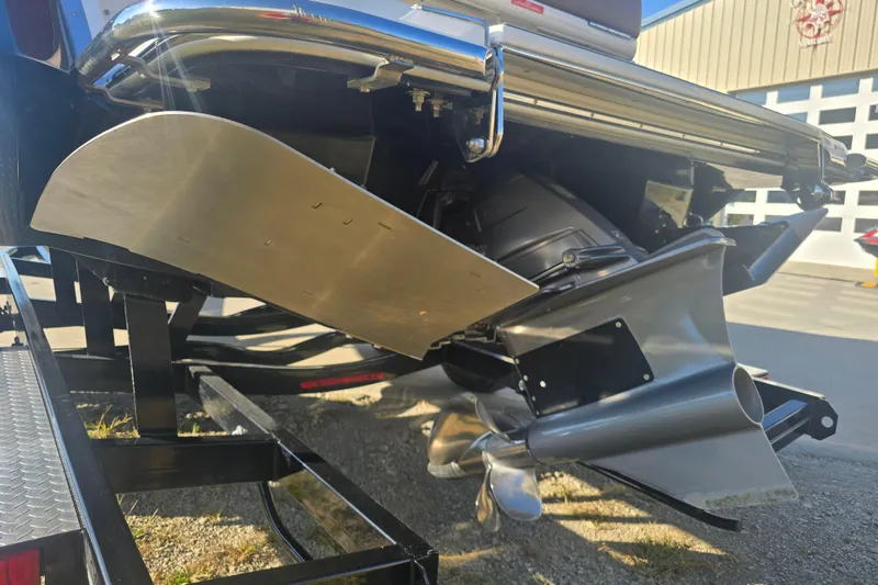 Slide: The Image of 2019 Cobalt R3 Surf boat's propeller and hull detail in sunlight. - 3