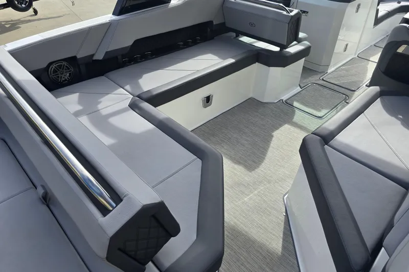 Slide: The Image of 2024 Cobalt R8 boat interior with sleek gray seating and modern design. - 4