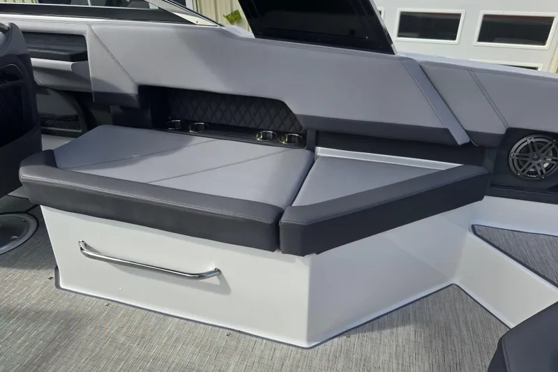 Slide: The Image of 2024 Cobalt R8 boat interior with sleek gray seating and integrated speaker system. - 5