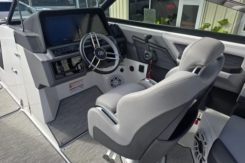 Slide: The Image of 2024 Cobalt R8 boat interior with modern helm and comfortable seating. - 7