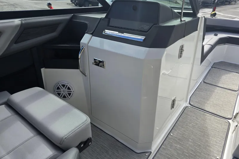 Slide: The Image of 2024 Cobalt R8 boat interior with sleek seating and modern dashboard design. - 9