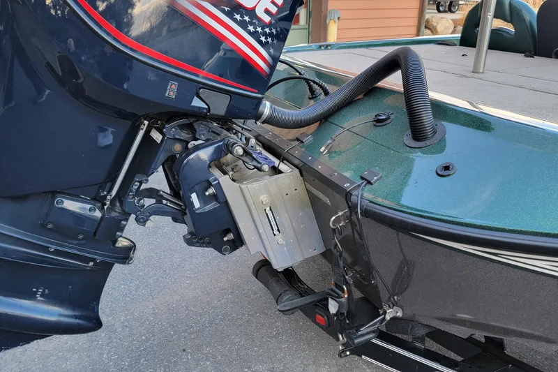 Slide: The Image of 2008 Champion 183 CX boat with outboard motor and hydraulic jack plate. - 5