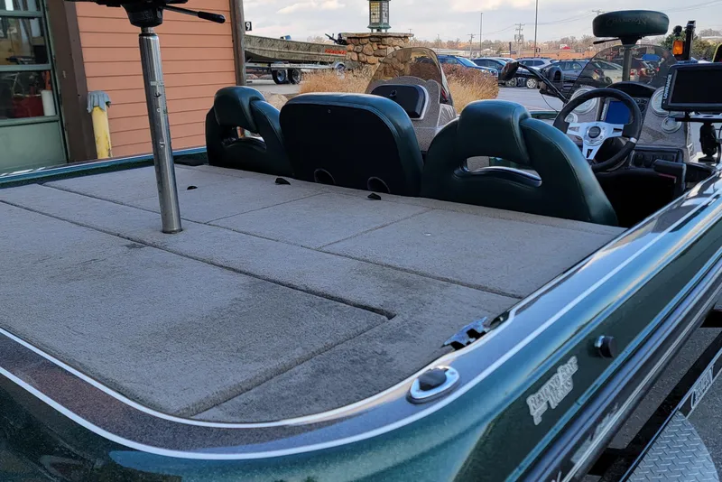 Slide: The Image of 2008 Champion 183 CX boat with spacious deck and dual seating. - 6