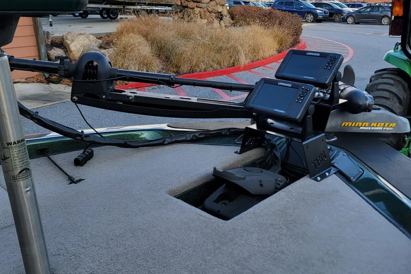 Slide: The Image of 2008 Champion 183 CX boat with Minn Kota trolling motor and Lowrance fish finders. - 8