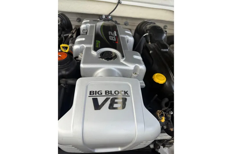 Slide: The Image of 2013 Sea Ray 300 Sundeck engine, featuring a powerful Big Block V8. - 10
