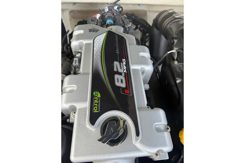 Slide: The Image of 2013 Sea Ray 300 Sundeck engine, MerCruiser 8.2 MAG, emissions control technology. - 12