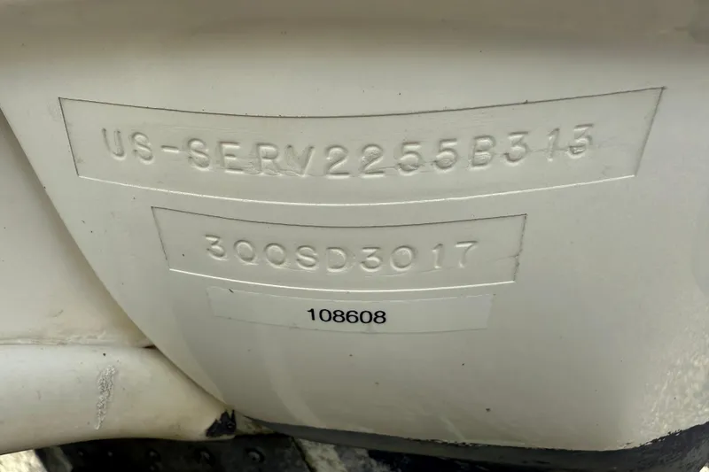 Slide: The Image of 2013 Sea Ray 300 Sundeck hull identification number and model details. - 28