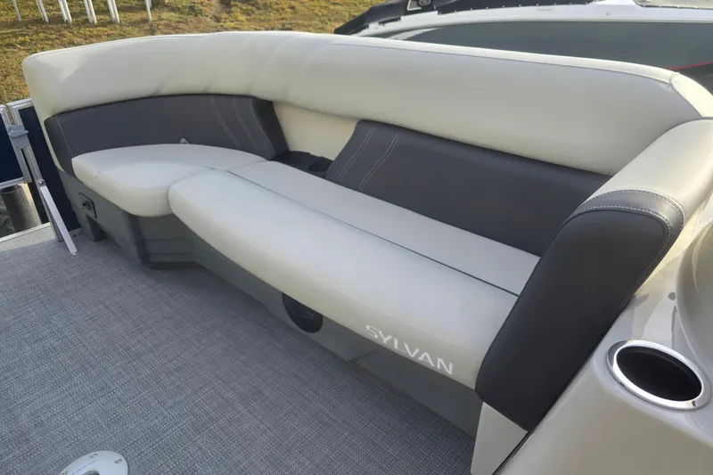 Slide: The Image of 2025 Sylvan Mirage Fish 8522 Party Fish boat interior with comfortable seating. - 14