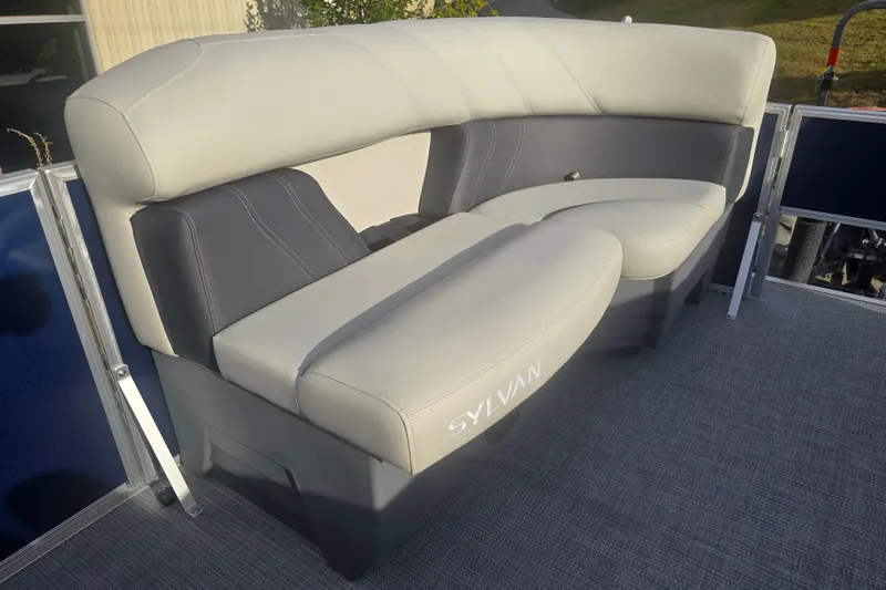 Slide: The Image of 2025 Sylvan Mirage Fish 8522 Party Fish boat seating, featuring sleek gray upholstery. - 16
