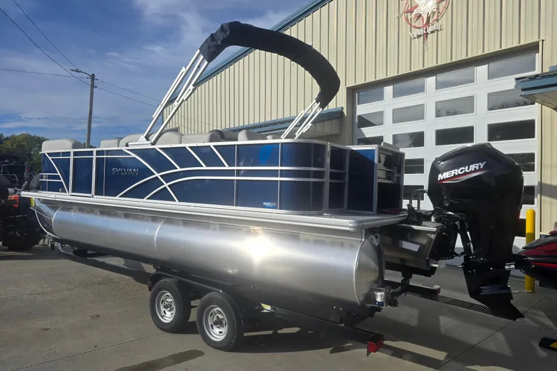 Slide: The Image of 2025 Sylvan Mirage Fish 8522 Party Fish pontoon boat with Mercury outboard motor. - 2