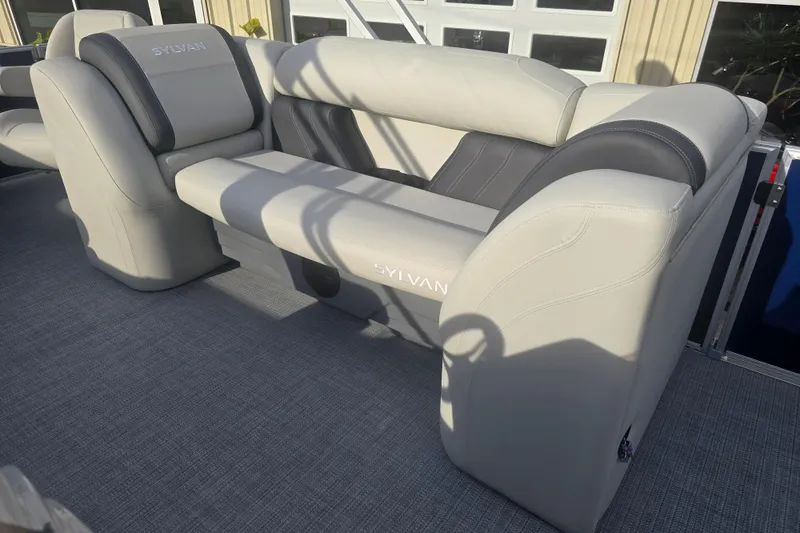 Slide: The Image of 2025 Sylvan Mirage Fish 8522 Party Fish boat interior with luxurious seating. - 22