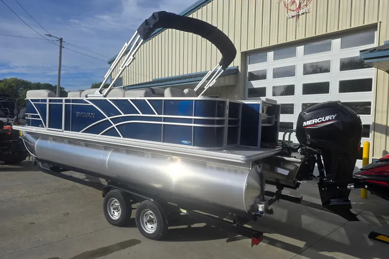 Slide: The Image of 2025 Sylvan Mirage Fish 8522 Party Fish pontoon boat with Mercury outboard motor. - 3
