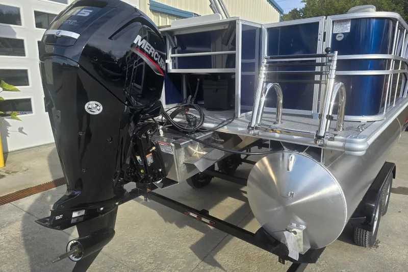 Slide: The Image of 2025 Sylvan Mirage Fish 8522 Party Fish pontoon boat with Mercury outboard motor. - 6