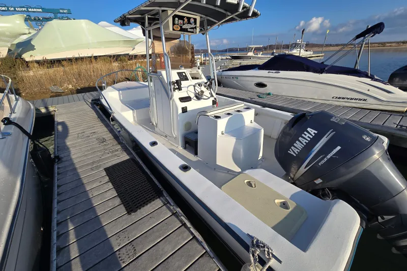 Slide: The Image of 2007 Cape Craft 22 Center Console boat docked with Yamaha outboard motor. - 3