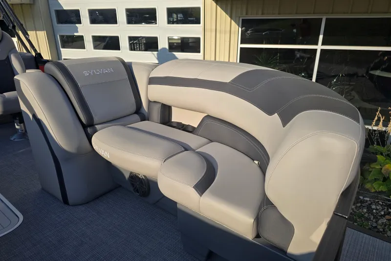Slide: The Image of 2024 Sylvan L3 LZ boat interior with luxurious gray seating and modern design. - 15