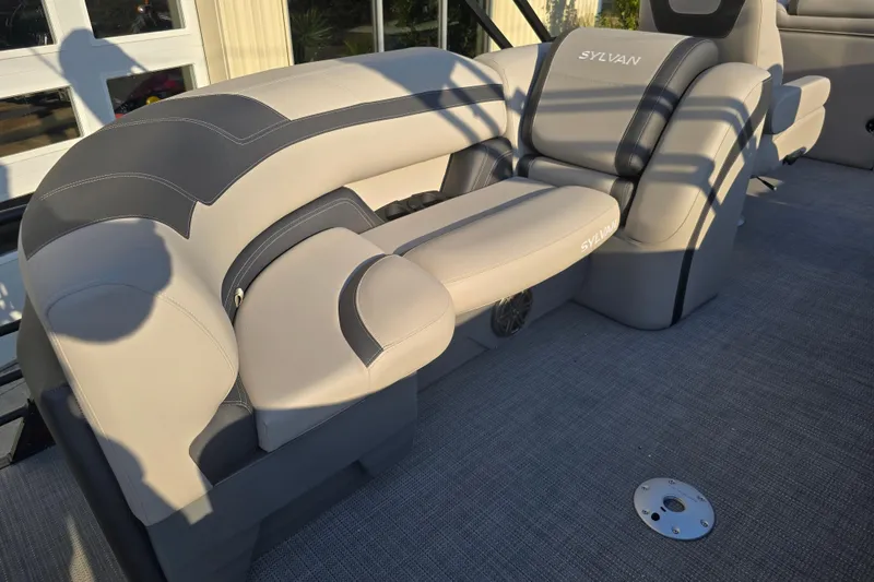 Slide: The Image of 2024 Sylvan L3 LZ boat interior with luxurious gray seating and stylish design. - 22
