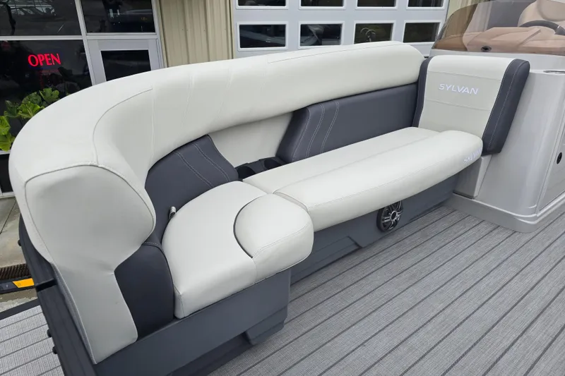 Slide: The Image of 2024 Sylvan Mirage X X5 CLZ boat interior with luxurious seating and modern design. - 10