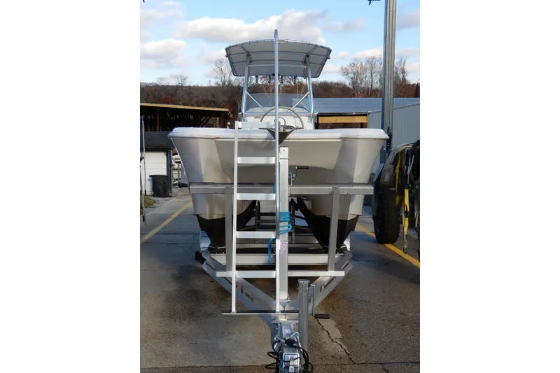Slide: The Image of 2022 Twin Vee 240 CC GFX Limited Edition boat on trailer, front view. - 2