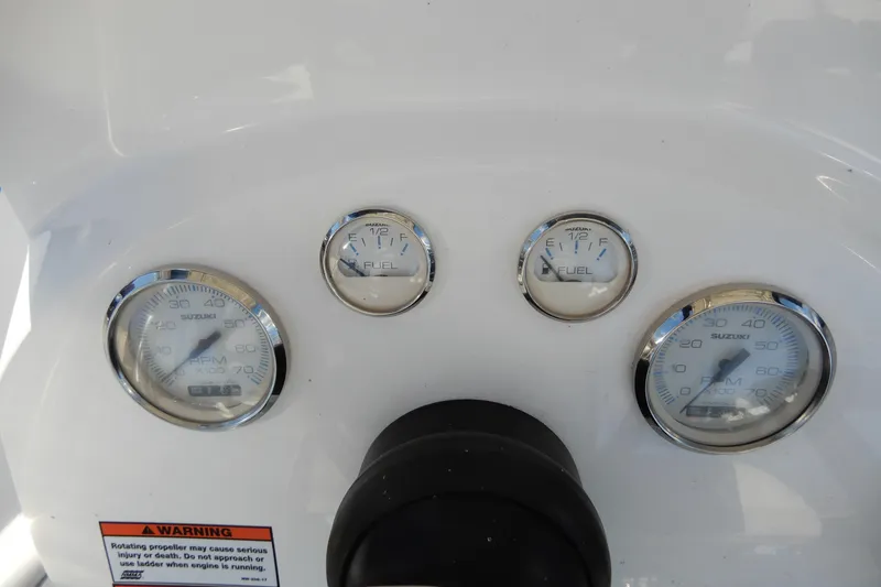 Slide: The Image of Dashboard of 2022 Twin Vee 240 CC GFX Limited Edition with Suzuki gauges. - 24