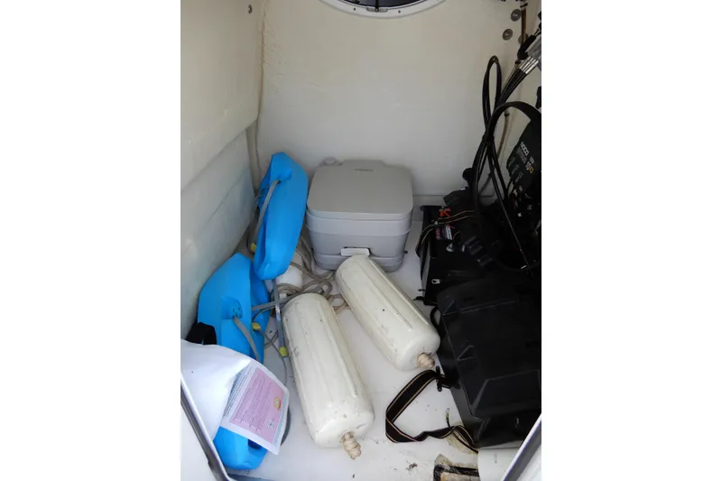 Slide: The Image of Interior of 2022 Twin Vee 240 CC GFX Limited Edition boat with equipment and storage. - 27