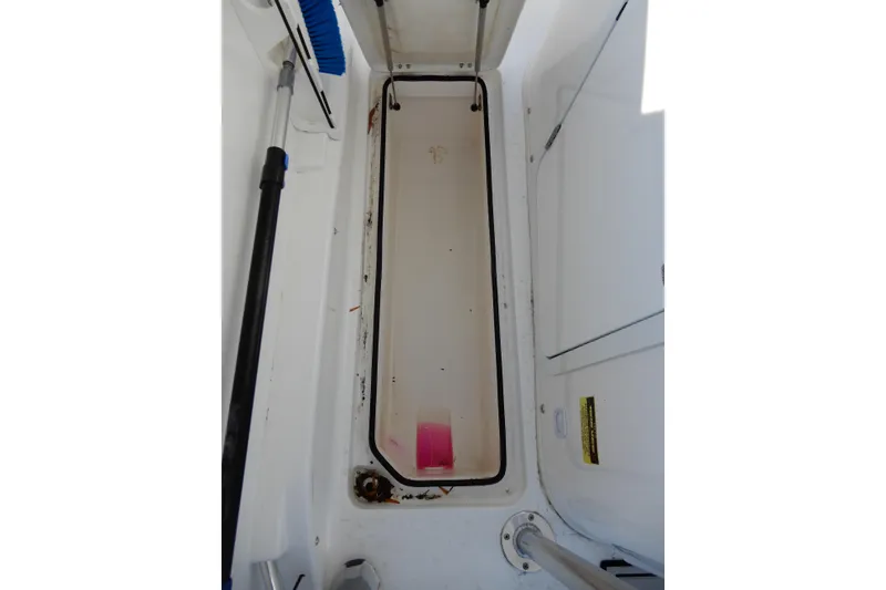 Slide: The Image of 2022 Twin Vee 240 CC GFX Limited Edition boat storage compartment interior. - 28