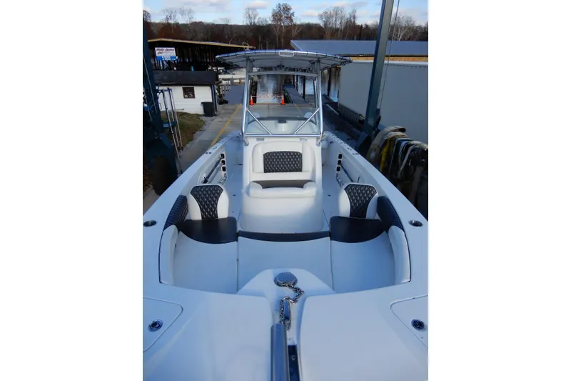 Slide: The Image of 2022 Twin Vee 240 CC GFX Limited Edition boat with spacious seating and sleek design. - 6