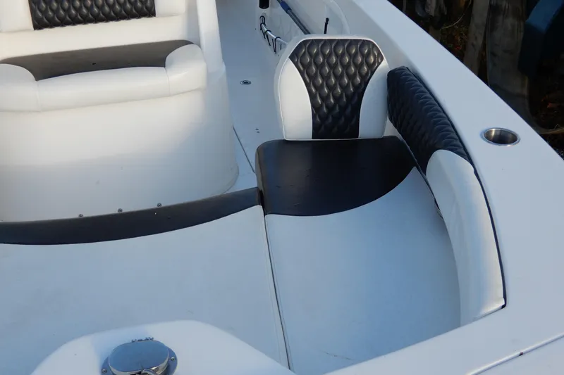 Slide: The Image of 2022 Twin Vee 240 CC GFX Limited Edition boat interior with stylish seating. - 7